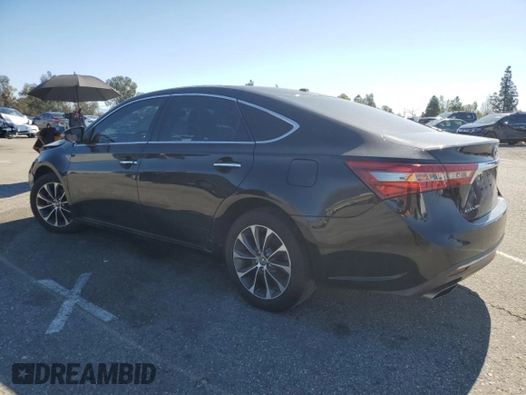 2016 Toyota Avalon Limited with VIN 4T1BK1EB4GU228276, listed as a Copart auction lot 48012315 with 166,692 mi miles and Salvage Title. Bid and sale history available at carsss.com. Image 2.