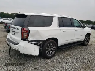 2021 Chevrolet Suburban LS with VIN 1GNSCBKD5MR392512, listed as a Copart auction lot 71238124 with 77,775 mi miles and Salvage Title. Bid and sale history available at DreamBid. Image 3.