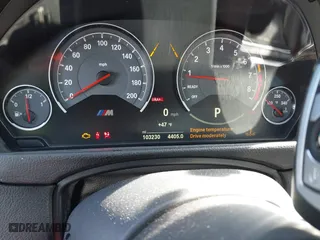 2019 BMW M4 with VIN WBS4Y9C5XKAG67446, listed as a IAAI auction lot 41669865 with 103,230 mi miles. Bid and sale history available at carsss.com. Image 7.