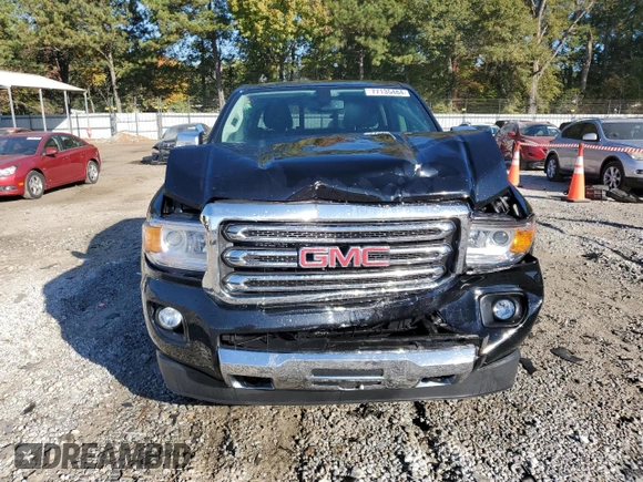 2018 GMC Canyon 4WD SLT with VIN 1GTG6DEN4J1296628, listed as a Copart auction lot 77135484 with 74,486 mi miles and Salvage Title. Bid and sale history available at carsss.com. Image 5.