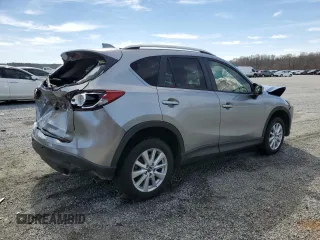 2014 Mazda CX-5 Touring with VIN JM3KE4CY1E0365787, listed as a Copart auction lot 49103355 with 144,031 mi miles and Salvage Title. Bid and sale history available at carsss.com. Image 3.