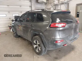 2016 Jeep Cherokee Trailhawk with VIN 1C4PJMBS2GW309042, listed as a IAAI auction lot 41564925 with 125,436 mi miles. Bid and sale history available at carsss.com. Image 3.
