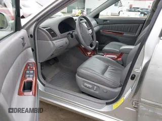 2005 Toyota Camry LE with VIN JTDBF30K650163057, listed as a IAAI auction lot 41730270 with 98,300 mi miles and . Bid and sale history available at DreamBid. Image 5.