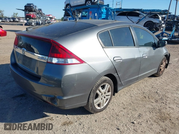 2012 Honda Insight LX with VIN JHMZE2H51CS003694, listed as a IAAI auction lot 41781384 with 154,685 mi miles and . Bid and sale history available at DreamBid. Image 4.