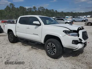 2023 Toyota Tacoma SR5 z VIN 3TMAZ5CN2PM217085, wystawiony jako Copart lot #53563675 z przebiegiem 7 389 mil mil oraz Szkoda całkowita • Salvage title. Historia ofert i sprzedaży dostępna na DreamBid. Obrazek 4.