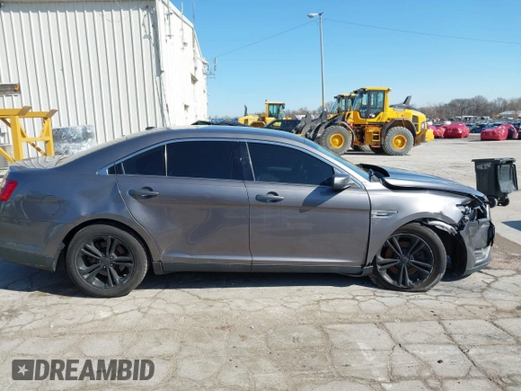 2013 Ford Taurus SEL z VIN 1FAHP2H83DG231000, wystawiony jako IAAI lot #41986420 z przebiegiem 200 390 mil mil oraz . Historia ofert i sprzedaży dostępna na DreamBid. Obrazek 13.