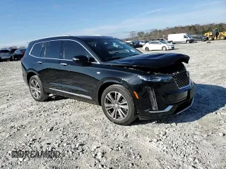 2021 Cadillac XT6 Premium Luxury z VIN 1GYKPDRS6MZ150397, wystawiony jako Copart lot #85137654 z przebiegiem 52 305 mil mil oraz Szkoda całkowita • Salvage title. Historia ofert i sprzedaży dostępna na DreamBid. Obrazek 11.