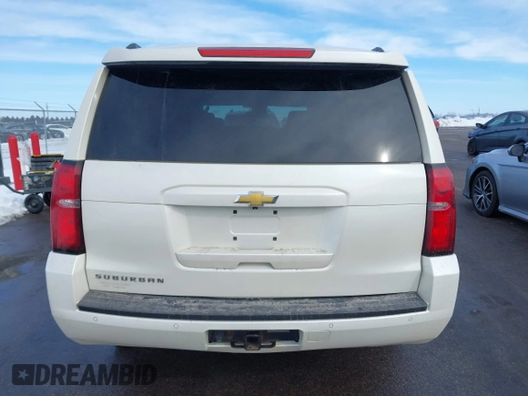 2015 Chevrolet Suburban LT with VIN 1GNSKJKC0FR309866, listed as a IAAI auction lot 41743848 with 220,778 mi miles and . Bid and sale history available at DreamBid. Image 16.