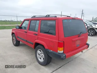 2001 Jeep Cherokee Sport with VIN 1J4FT48S01L537833, listed as a IAAI auction lot 41943255 with 239,473 mi miles. Bid and sale history available at carsss.com. Image 3.