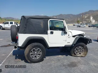 2003 Jeep Wrangler X with VIN 1J4FA39S73P321181, listed as a IAAI auction lot 42462732 with 170,460 mi miles and . Bid and sale history available at DreamBid. Image 14.