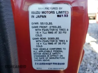 1993 Isuzu Trooper S z VIN JACDH58V2P7912099, wystawiony jako Copart lot #65121945 z przebiegiem 201 520 mil mil oraz Szkoda całkowita • Salvage title. Historia ofert i sprzedaży dostępna na DreamBid. Obrazek 13.