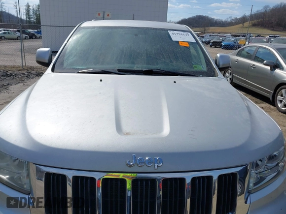 2013 Jeep Grand Cherokee Laredo with VIN 1C4RJFAG5DC634685, listed as a IAAI auction lot 41792147 with 260,594 mi miles. Bid and sale history available at carsss.com. Image 6.