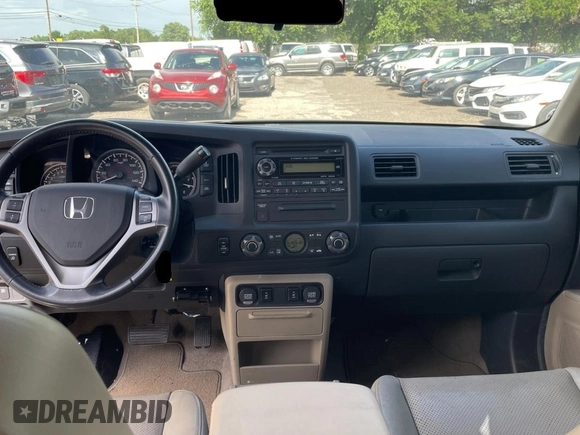 2009 Honda Ridgeline RTL with VIN 2HJYK16539H500759, listed as a Copart auction lot 63874225 with 123,508 mi miles and Clean title. Bid and sale history available at DreamBid. Image 9.