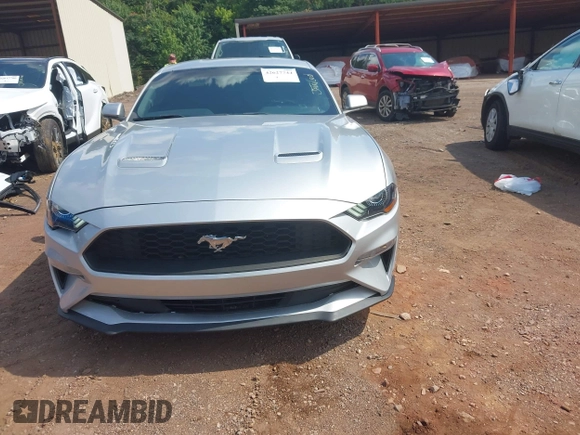 2018 Ford Mustang EcoBoost z VIN 1FA6P8TH6J5174509, wystawiony jako IAAI lot #42627744 z przebiegiem 83 093 mil mil oraz . Historia ofert i sprzedaży dostępna na DreamBid. Obrazek 12.