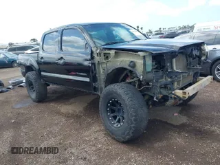 2014 Toyota Tacoma with VIN 5TFLU4ENXEX106368, listed as a IAAI auction lot 41954580 with 161,216 mi miles. Bid and sale history available at carsss.com. Image 1.