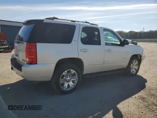 2013 GMC Yukon SLT with VIN 1GKS1CE05DR259086, listed as a Copart auction lot 42103305 with 130,079 mi miles and Salvage Title. Bid and sale history available at carsss.com. Image 3.