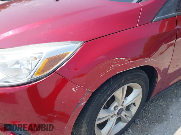 2013 Ford Focus SE z VIN 1FADP3F27DL350923, wystawiony jako IAAI lot #42405976 z przebiegiem 126 730 mil mil oraz . Historia ofert i sprzedaży dostępna na DreamBid. Obrazek 18.