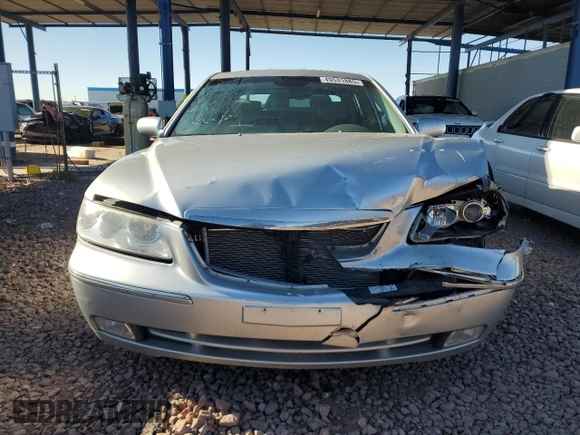 2007 Hyundai Azera SE z VIN KMHFC46F57A205043, wystawiony jako Copart lot #49531885 z przebiegiem 107 272 mil mil oraz Czysty tytuł • Clean title. Historia ofert i sprzedaży dostępna na DreamBid. Obrazek 5.