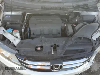 2014 Honda Odyssey EX-L with VIN 5FNRL5H61EB005740, listed as a Copart auction lot 54663595 with 118,971 mi miles and Salvage Title. Bid and sale history available at DreamBid. Image 12.