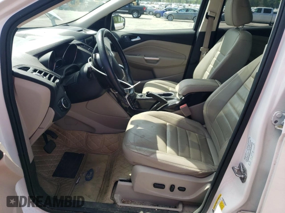 2016 Ford Escape Titanium with VIN 1FMCU9J91GUB52418, listed as a Copart auction lot 52644135 with 107,212 mi miles and Salvage Title. Bid and sale history available at carsss.com. Image 7.