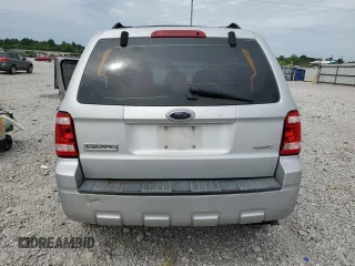 2009 Ford Escape XLS z VIN 1FMCU92789KB10338, wystawiony jako Copart lot #57452495 z przebiegiem 285 171 mil mil oraz Szkoda całkowita • Salvage title. Historia ofert i sprzedaży dostępna na DreamBid. Obrazek 6.