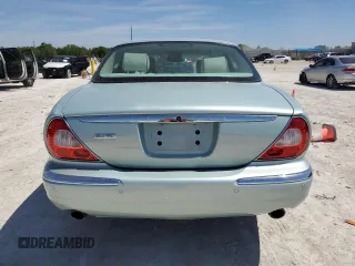 2005 Jaguar XJ Vanden Plas z VIN SAJWA82CX5SG35644, wystawiony jako Copart lot #49029245 z przebiegiem 88 771 mil mil oraz Szkoda całkowita • Salvage title. Historia ofert i sprzedaży dostępna na DreamBid. Obrazek 6.
