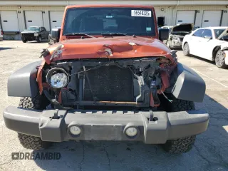 2014 Jeep Wrangler Rubicon with VIN 1C4BJWCG9EL285532, listed as a Copart auction lot 56548325 with 100,032 mi miles and Salvage title. Bid and sale history available at DreamBid. Image 5.