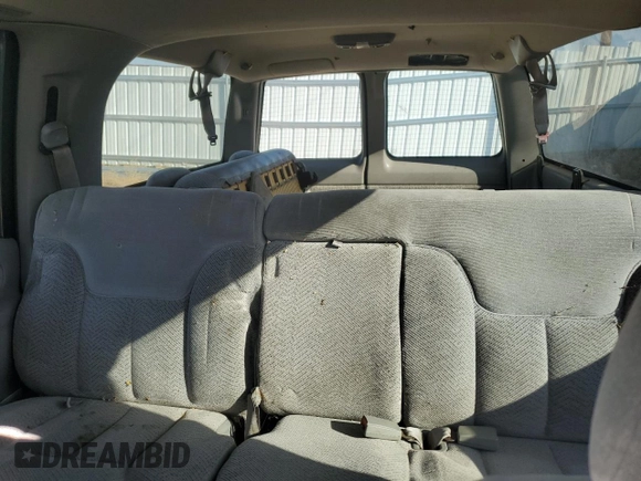 1999 Chevrolet Suburban with VIN 1GNFK16R4XJ483035, listed as a Copart auction lot 76666034 with 215,048 mi miles and Clean Title. Bid and sale history available at carsss.com. Image 10.
