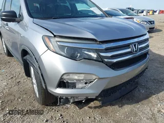 2016 Honda Pilot LX with VIN 5FNYF5H17GB029339, listed as a IAAI auction lot 41837038 with Not Provided miles and . Bid and sale history available at DreamBid. Image 16.