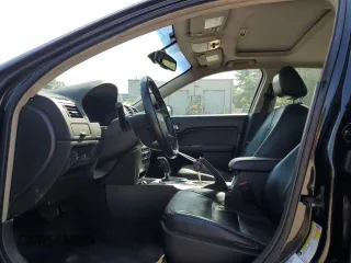 2011 Ford Fusion Hybrid с VIN 3FADP0L37BR131390, выставлен на аукционе Copart как лот 56880435 с пробегом 240 955 миль миль и Чистый • Clean title. История ставок и продаж доступна на DreamBid. Изображение 7.