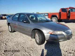1998 Chrysler Cirrus LXi z VIN 1C3EJ56H4WN236597, wystawiony jako Copart lot #79936954 z przebiegiem 118 555 mil mil oraz Szkody całkowita. Historia ofert i sprzedaży dostępna na DreamBid. Obrazek 4.