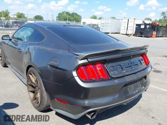 2015 Ford Mustang EcoBoost with VIN 1FA6P8TH8F5394953, listed as a IAAI auction lot 42618352 with 101,302 mi miles and . Bid and sale history available at DreamBid. Image 3.