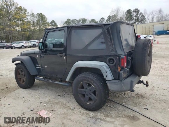 2012 Jeep Wrangler Sport with VIN 1C4GJWAG6CL167329, listed as a Copart auction lot 88895815 with 147,448 mi miles and Clean Title. Bid and sale history available at DreamBid. Image 2.