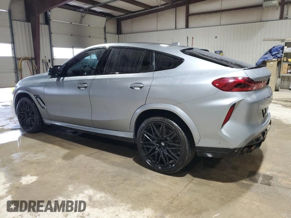 2024 BMW X6 M with VIN 5YM23ET0XR9U26576, listed as a Copart auction lot 86698164 with 6,669 mi miles and Salvage Title. Bid and sale history available at carsss.com. Image 2.