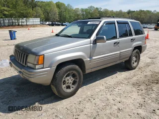 1998 Jeep Grand Cherokee Limited with VIN 1J4GZ78YXWC160346, listed as a Copart auction lot 52595655 with Not provided miles and Salvage title. Bid and sale history available at DreamBid. Image 1.