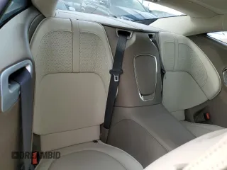 2025 Aston Martin DB12 z VIN SCFRMFFW4SGL15065, wystawiony jako Copart lot #74953394 z przebiegiem Nie podano mil oraz Nie do naprawy. Historia ofert i sprzedaży dostępna na DreamBid. Obrazek 10.