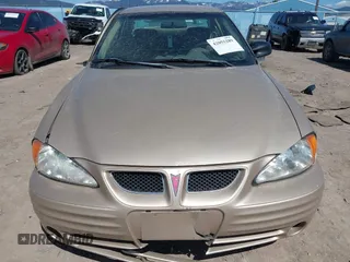 2001 Pontiac Grand Am z VIN 1G2NF12T51M534918, wystawiony jako IAAI lot #42055289 z przebiegiem 128 155 mil mil oraz . Historia ofert i sprzedaży dostępna na DreamBid. Obrazek 13.