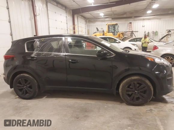 2018 Kia Sportage LX with VIN KNDPM3AC6J7417371, listed as a IAAI auction lot 41879390 with 112,944 mi miles and . Bid and sale history available at carsss.com. Image 13.