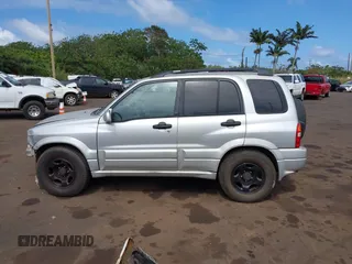 2002 Suzuki Grand Vitara z VIN JS3TE62VX24154173, wystawiony jako IAAI lot #41711181 z przebiegiem 224 024 mil mil oraz . Historia ofert i sprzedaży dostępna na DreamBid. Obrazek 15.