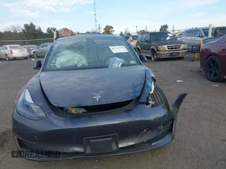 2021 Tesla Model 3 Long Range with VIN 5YJ3E1EB6MF975916, listed as a IAAI auction lot 40713749 with 29,593 mi miles and . Bid and sale history available at DreamBid. Image 11.