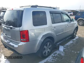 2014 Honda Pilot Touring with VIN 5FNYF4H9XEB038551, listed as a IAAI auction lot 41585720 with 150,725 mi miles and . Bid and sale history available at carsss.com. Image 4.
