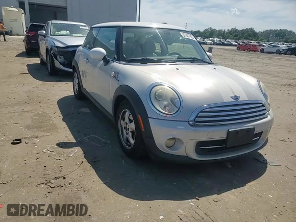 2011 MINI Hardtop with VIN WMWSU3C5XBTX96048, listed as a Copart auction lot 57607955 with 99,632 mi miles and Salvage title. Bid and sale history available at DreamBid. Image 13.
