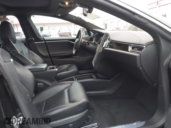 2016 Tesla Model S 70 with VIN 5YJSA1E1XGF154577, listed as a IAAI auction lot 41778697 with 62,630 mi miles and . Bid and sale history available at DreamBid. Image 5.