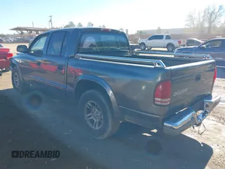 2003 Dodge Dakota SLT with VIN 1D7HL48X03S174569, listed as a IAAI auction lot 41159169 with 156,551 mi miles. Bid and sale history available at carsss.com. Image 3.