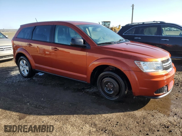 2013 Dodge Journey American Value with VIN 3C4PDCAB4DT590975, listed as a Copart auction lot 55627725 with 212,659 mi miles and Clean Title. Bid and sale history available at DreamBid. Image 4.