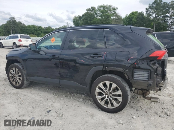 2021 Toyota RAV4 XLE Premium with VIN 2T3C1RFV9MW162776, listed as a Copart auction lot 55336675 with 79,060 mi miles and Salvage title. Bid and sale history available at DreamBid. Image 2.