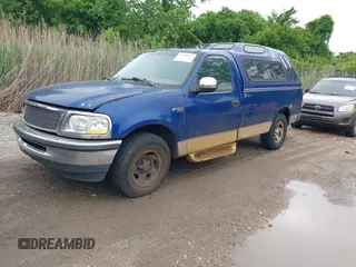 1998 Ford F-150 with VIN 1FTZF1725WNB76296, listed as a IAAI auction lot 42278511 with 223,324 mi miles and . Bid and sale history available at DreamBid. Image 2.