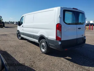 2023 Ford Transit Cargo with VIN 1FTYE1Y82PKA84762, listed as a IAAI auction lot 41718720 with 21,029 mi miles and . Bid and sale history available at DreamBid. Image 3.