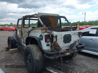 2012 Jeep Wrangler Unlimited Sahara with VIN 1C4BJWEG0CL167797, listed as a IAAI auction lot 42331710 with Not provided miles and . Bid and sale history available at DreamBid. Image 3.