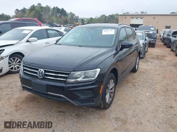 2018 Volkswagen Tiguan S with VIN 3VV0B7AX4JM098495, listed as a IAAI auction lot 41937757 with 179,168 mi miles and . Bid and sale history available at DreamBid. Image 2.